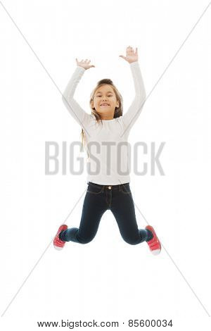 Little pretty girl jumping with joy