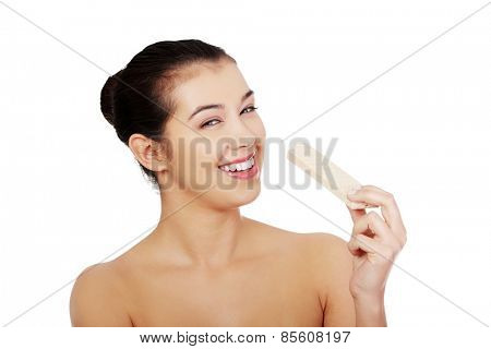 Beautiful woman holding a waffer