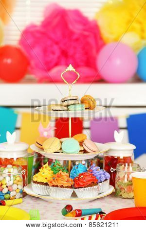 Prepared birthday table with sweets for children party