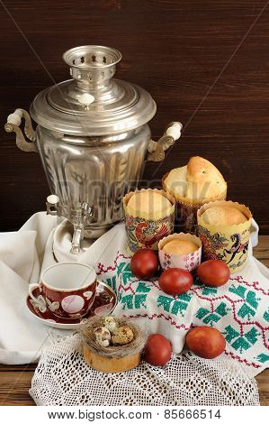Kulichi, Traditional Russian Easter Cakes With Samovar, Dyed Eggs And Bird Nest On Handmade Rushnik