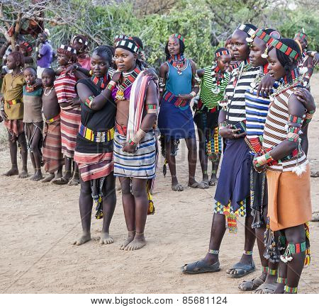 Boys And Girls At The Traditional Evangaty Ceremony. Turmi, Ethiopia