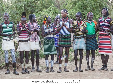 Boys And Girls At The Traditional Evangaty Ceremony. Turmi, Ethiopia