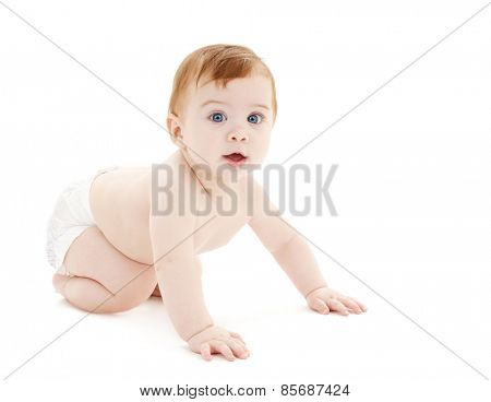 bright picture of crawling curious baby over white backgroubd