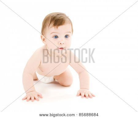 bright picture of crawling curious baby over white backgroubd