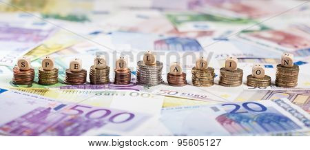 German Word Spekulation On Coin Stacks, Cash Background