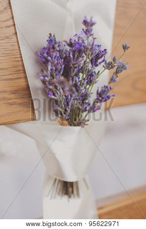 Beautiful wedding chairs lavanda flower decorations