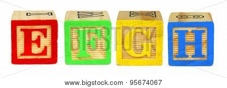 E F G H toy wooden letter blocks