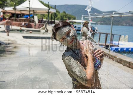 SULTANIYE, TURKEY - JULY 05, 2015: Woman taking a mud bath.