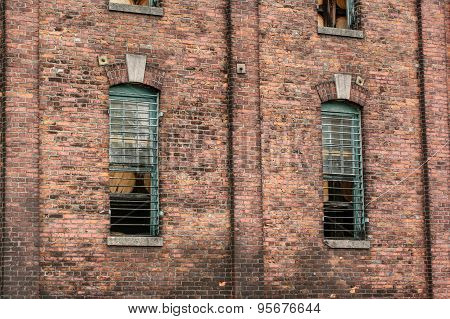 Brick wall with iron shutters