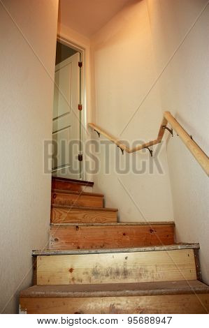 A flight of stairs leading to the upstairs from the basement for a new house being built.