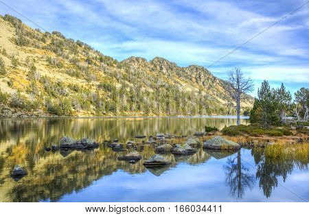 The beautiful Lac d'Aubert located in Pyrenees Mountains in Neouvielle Massif.