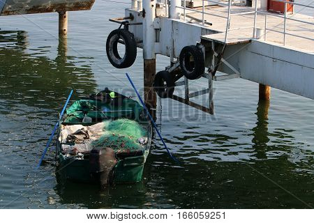 dock on the shore of Lake Kinneret, the water level in the lake dropped by 5 meters