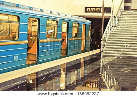 Subway station with blue vagon in Kyiv underground, Ukraine