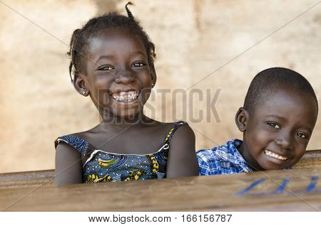 Happiness Symbol: Couple of African Children Laughing at School
