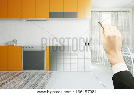 businessman hand drawing kitchen interior. 3D Rendering