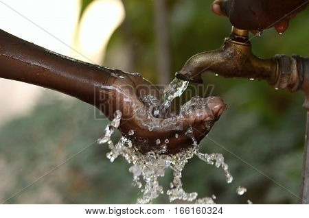 Climate Change Symbol: Handful Of Water Scarsity for Africa Symbol