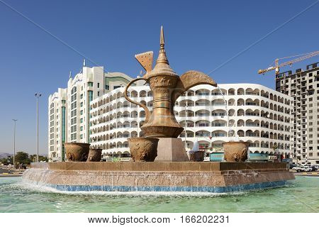 FUJAIRAH UAE - DEC 1 2016: Arabian coffeepot fountain monument in the city of Fujairah United Arab Emirates