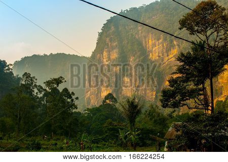 Cliff in golden evening light, the gorge of the Harau valley