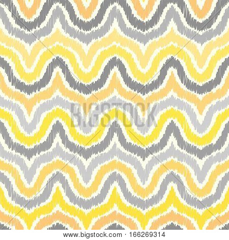Seamless yellow geometric pattern, based on ikat fabric style.
