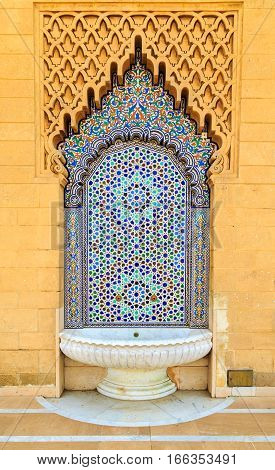Moroccan Style Fountain With Fine Colorful Mosaic Tiles At The Mohammed V Mausoluem In Rabat