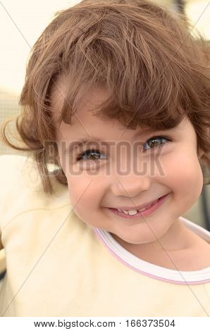 Portrait of a pretty little girl with cute smile