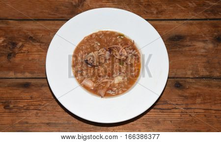 Detail of a plate of soupy rice