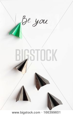 choice concept paper boats on white background top view.