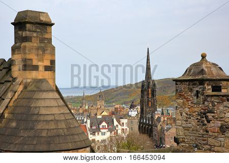EDINBURGH, SCOTLAND - MAY 6, 2016: General view of Edinburgh from Edinburgh Castle (The Argyle Tower in the foreground)