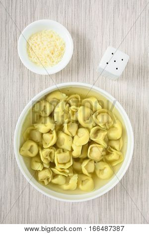 Traditional Italian Tortellini in Brodo (broth) soup photographed overhead with natural light