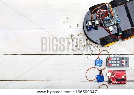 the robot and the elements needed to build the robot. PCB Servo Screwdriver