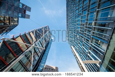 LONDON UK - 2 NOVEMBER 2016: Low and wide angle view of modern high rise apartment blocks in the Bankside area of London. The brick Tate Modern building is visible in the lower centre of the frame.