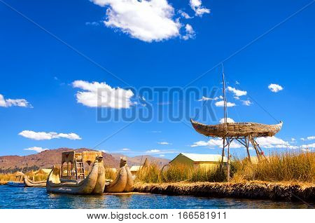 Boats and floating islands made of reeds known as totora on Lake Titicaca in Peru