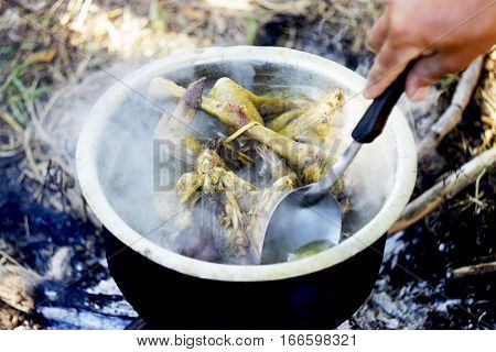 Boiled Chicken In A Pot Of Boiling Water