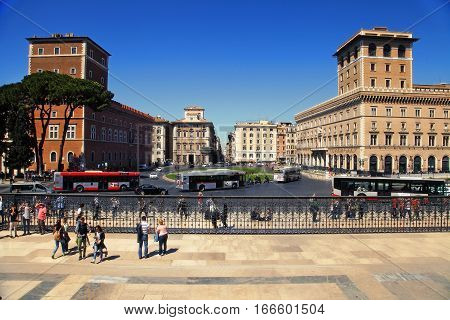 Rome Italy - APRI 11 2016 : Piazza Venezia street view with walking tourists and cars
