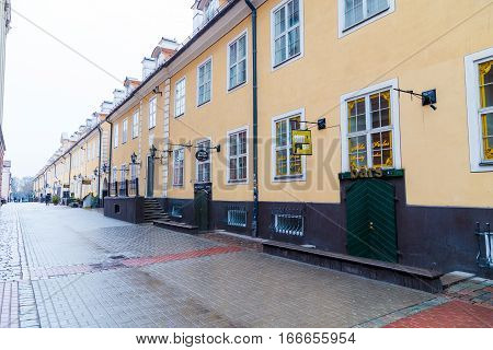 RIGA LATVIA - 2ND JAN 2017: A view along Torna Iela in Riga during the day showing the outside of shops and restaurants.