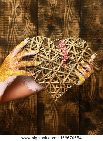 Female Hand Holding Heart