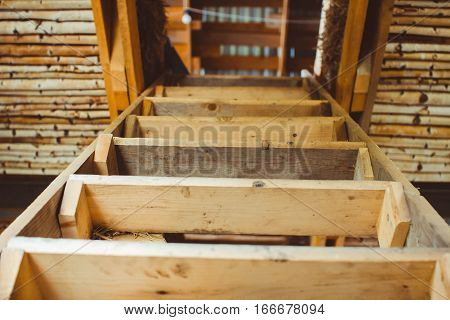wooden staircase goes up in an unfinished house