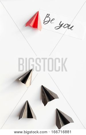 choice concept paper boats on white background top view.