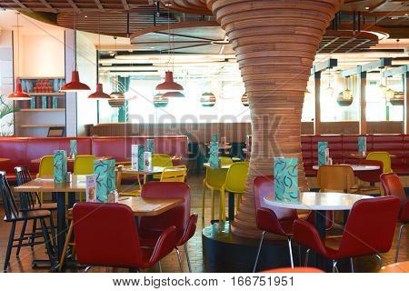 DUBAI, UAE - CIRCA NOVEMBER, 2016: inside Dubai Airport. There are a lot of restaurants, bars, cafes and shops in Dubai International Airport. Almost all of them are open twenty-four hours.