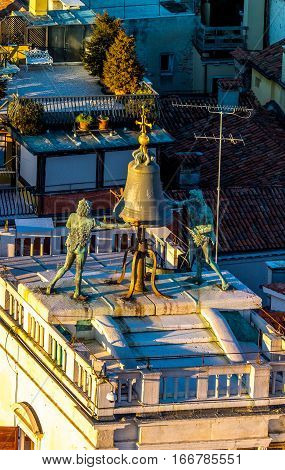 Zodiac clock in Venice, Italy. Clock Tower with  two moors striking the bell - early Renaissance (1497) building in Venice, located the north side of Piazza San Marco, Italy. Aerial view.