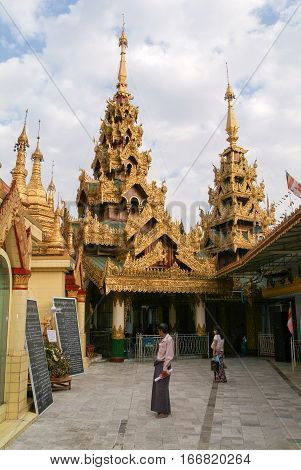 Yangon Myanmar - 9 January 2010: People walking in the area of the Sule Paya Pagoda in Yangon on Myanmar
