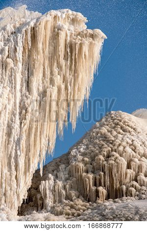 Beautiful stalactites created by waste water of sugar factory into sludge fields in winter. Litovel, Czech Republic