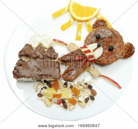 creative breakfast food with fruit and chocolate sweet cream on bread