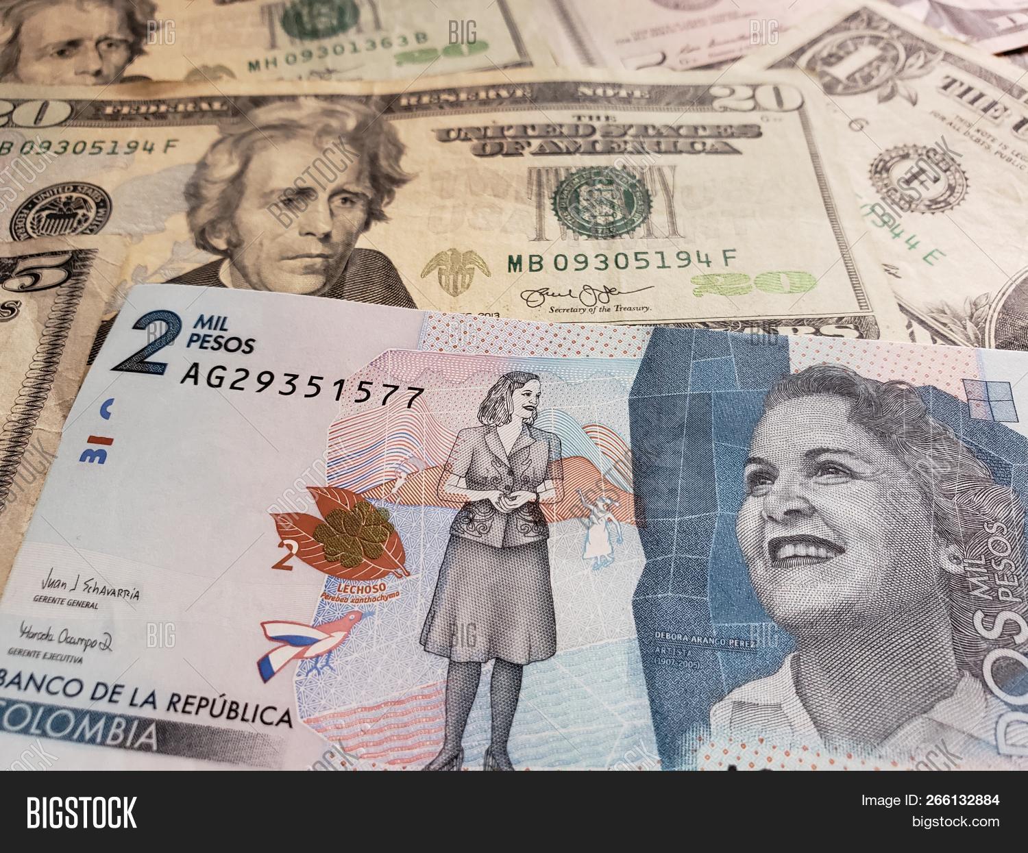 Colombian Banknote Image Photo Free Trial Stock Colombian Banknote Of 2000 Pesos And American Dollars Bills Background Texture