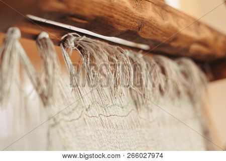 Close - Up Of Threads In Old Loom, Used For Weaving Rug