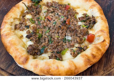 Turkish Round Pide With Meat Kiyma And Cheese.