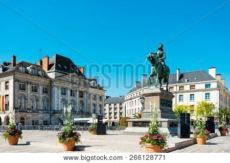 ORLEANS, FRANCE - May 8, 2018: statue Joan of Arc is an 1874 French gilded bronze equestrian sculpture of Orleans Cathedral in Orleans, France