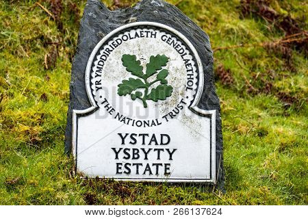 Wales , United Kingdom - April 04 2018 : Sign Pointing To The Beginning Of The Ystad Ysbyty Estate