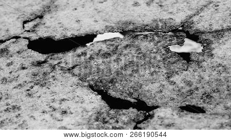 Rusty Steel Sheet With Holes Of Old Black And White