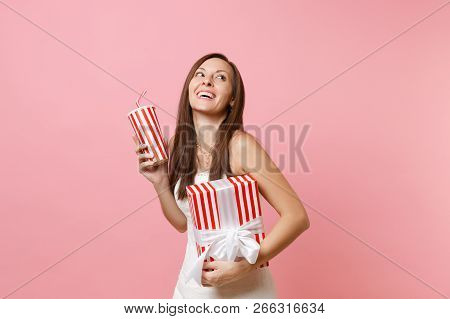 Portrait Of Cheerful Bride Woman In Wedding Dress Looking Up Hold Red Box With Gift, Present, Placti